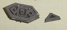 Stamp used to put design on pauldron scales